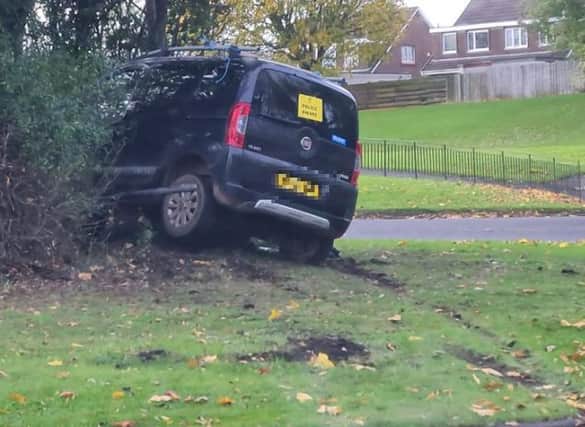 Black vehicle spotted in bushes in Musselburgh as public concerned for passengers' well-being (Photo: Leigh-Ann Hart).
