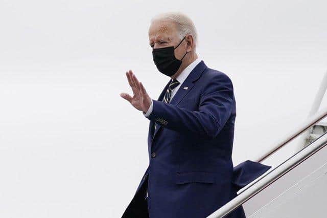 President Joe Biden arrives at Edinburgh Airport to attend the COP26 U.N. Climate Summit, Monday, Nov. 1, 2021, in Edinburgh, Scotland. (AP Photo/Evan Vucci)