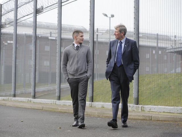 Kenny MacAskill, Justice Secretary at Saughton Prison in April, 2013, announcing funding of £7.7 million  for organisations who work with younger prolific offenders to turn their lives around. He is pictured with ex offender Sean Kerr who now works as a mentor for Action for Children.