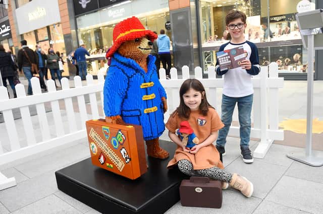 6-year-old Penelope and 8-year-old Josh with Paddington at the Paddington Bear Bricklive event on Saturday.

Pic Greg Macvean 09/10/2021 - The Centre, Livingston