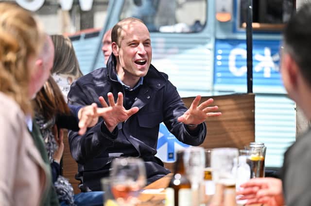 The Duke of Cambridge watches the Scottish Cup Final with emergency responders at the Cold Town House in the Grassmarket rooftop bar in Edinburgh picture: Jeff J Mitchell