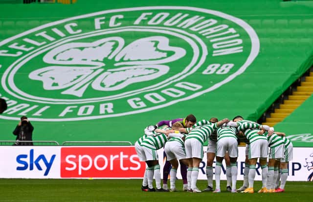 Celtic players huddle together prior to defeat to Rangers in October. Picture: SNS