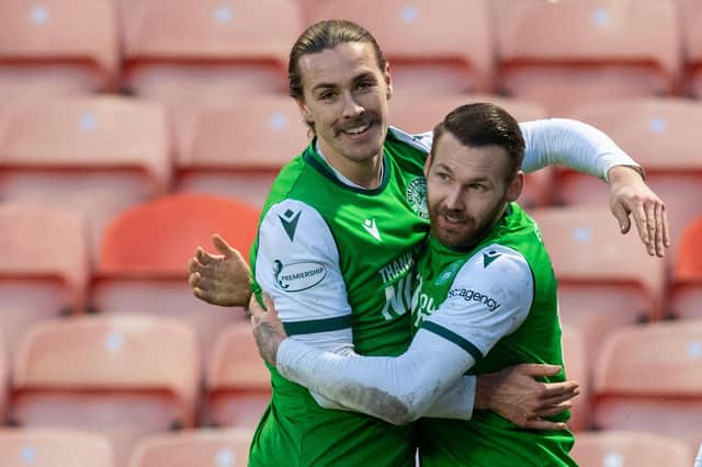 Jackson Irvine and Martin Boyle celebrate a goal made in Australia. The winger netted Hibs' second from Irvine's pass