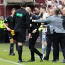 Hibs boss Lee Johnson, right, clashes with Hearts technical director Steven Naismith at the conclusion of the previous Edinburgh derby on the final day of last season. Picture: SNS