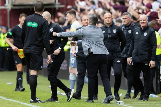 Hibs boss Lee Johnson, right, clashes with Hearts technical director Steven Naismith at the conclusion of the previous Edinburgh derby on the final day of last season. Picture: SNS