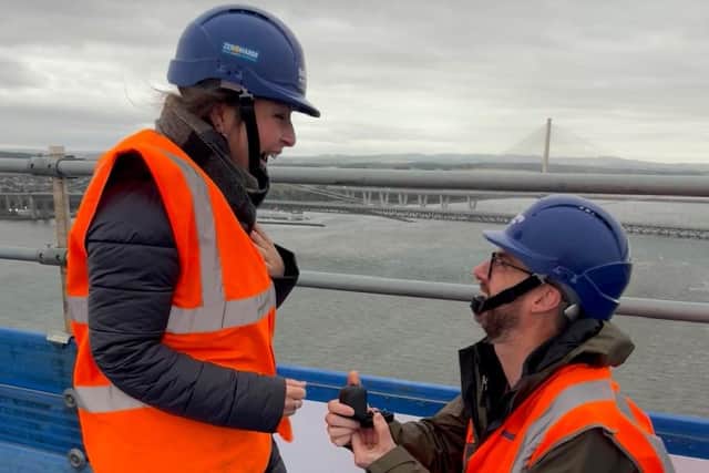 A West Lothian couple got engaged at the top of the iconic Forth Bridge on Sunday.