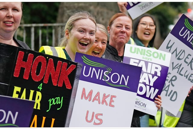 School support workers, who are members of Unison, on the picket line at Holy Cross RC Primary School in Edinburgh. The dispute is over a revised pay offer from umbrella body the Convention of Scottish Local Authorities (Cosla) for a pay increase for janitors, cleaners, and support workers, who are some of the lowest paid council employees.