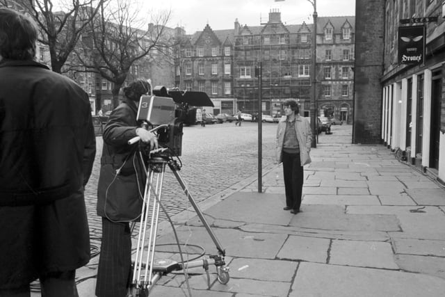 Actor James Hazeldine is pictured in the Grassmarket during the filming of The Omega Factor TV series for the BBC in February 1979. The series centred on journalist Tom Crane, played by Hazeldine, who possesses untapped psychic powers that bring him to the attention of the scientists who comprise Department 7, a secret "need to know only" government organisation which investigates paranormal phenomena and the potential of the human mind. The 10 50 minute long episodes aired on BBC1 between June and August in 1979.