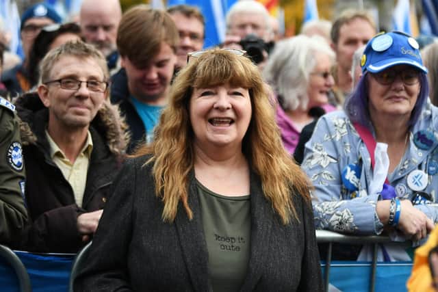 Janey Godley listens as Nicola Sturgeon addresses a rally in George Square (Picture: John Devlin)