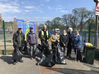 The group of volunteers collected ten bags of rubbish and two boxes of glass from Leith Links as part of Earth Day
