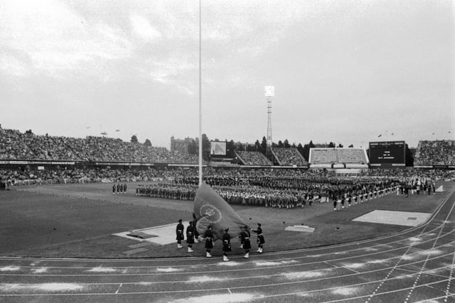 The official flag is raised at the opening ceremony of the Edinburgh Commonwealth Games 1986, held at Meadowbank Stadium.