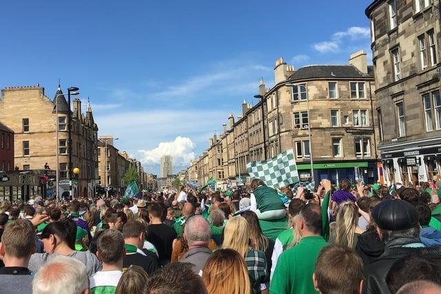 Hibs fans line Leith Walk as the victory parade makes its way to Leith Links. Photo: Submitted