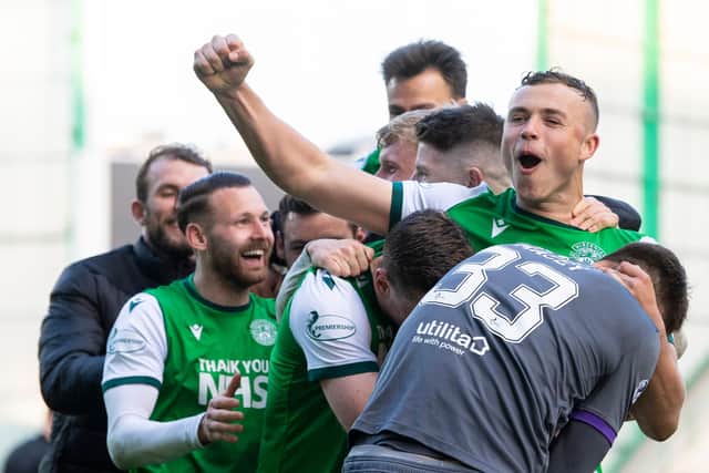 Hibs defender Ryan Porteous celebrates after he scored the winning penalty in the Scottish Cup quarter-final triumph over Motherwell. Photo by Ross Parker / SNS Group