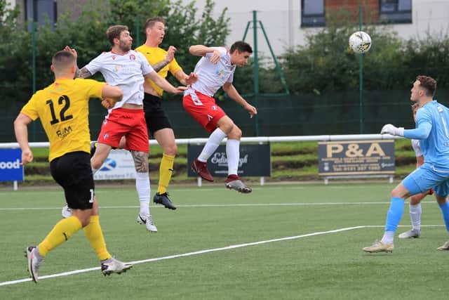 Callum Connolly heads in Bonnyrigg's second goal against Spartans (pic: Joe Gilhooley)