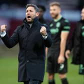 Manager Lee Johnson celebrates after Hibs defeated Motherwell at Fir Park on Sunday. Picture: SNS