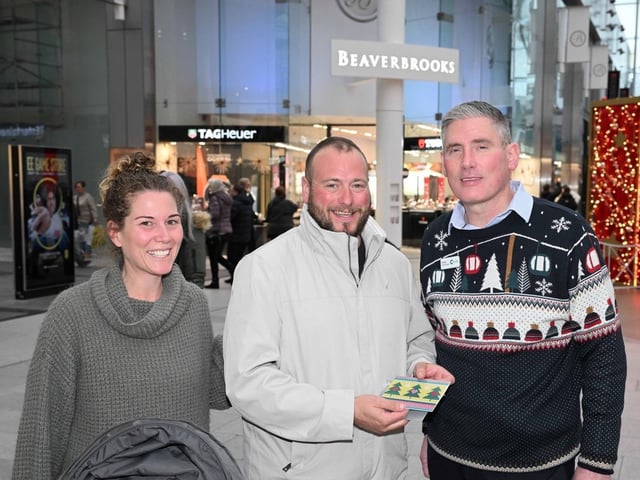 These happy shoppers picked up a gift card for the Centre in Livingston last week ahead of Christmas Day.
