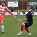Kerr Young up against Dumbarton's Gregg Wylde. Picture: Joe Gilhooley LRPS.