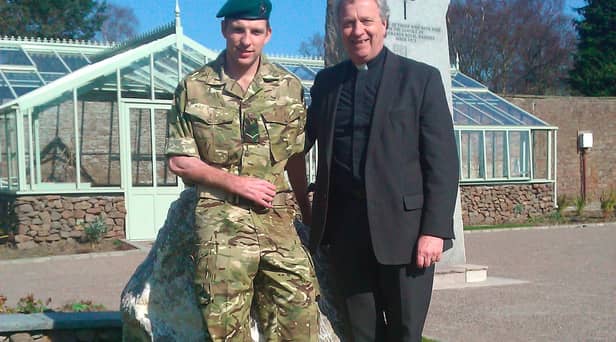 Very Rev Dr John Chalmers with his son, JJ Chalmers.