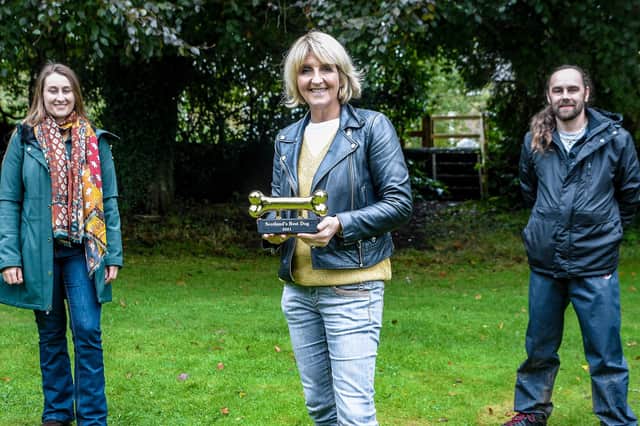 Scotland's Best Dog judges River McDonald, Kaye Adams and  Alan Grant with the Golden Bone trophy