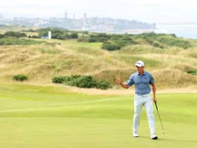 Grant Forrest waves to the crowd on the 18th green after shooting 62 in the third round of the Hero Open at Fairmont St Andrews. Picture: Andrew Redington/Getty Images.