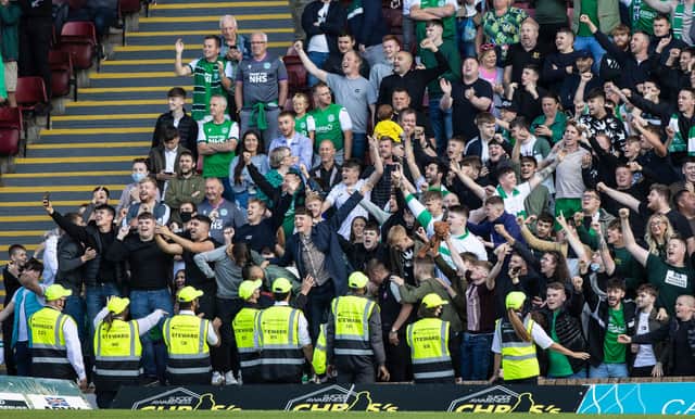 Hibs fans celebrate the opening-day win