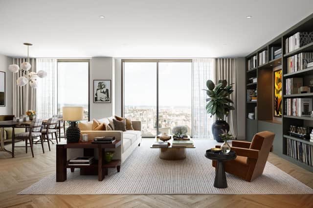 The apartments feature floor-to-ceiling windows and natural materials such as stone worktops and wooden flooring