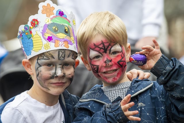 Mason and Campbell Fletcher, aged six and four respectively, show off their face paints and Easter crown.