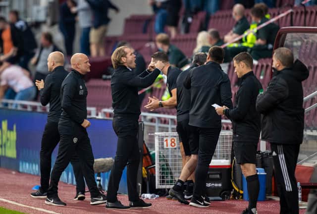 Robbie Neilson celebrates after Hearts' late winner against Celtic.