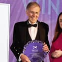 Edinburgh Evening News political editor, Ian Swanson, was presented with his lifetime achievement award at the Scottish press awards by deputy first minister Kate Forbes (Picture: Andy Barr)