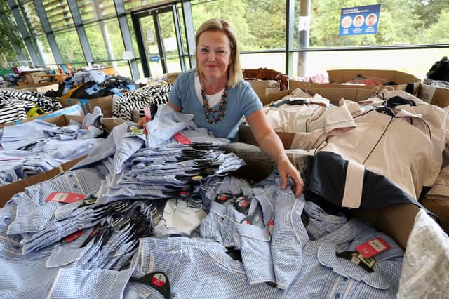 Sheena Hales at the clothes donation centre. Picture: Stewart Attwood