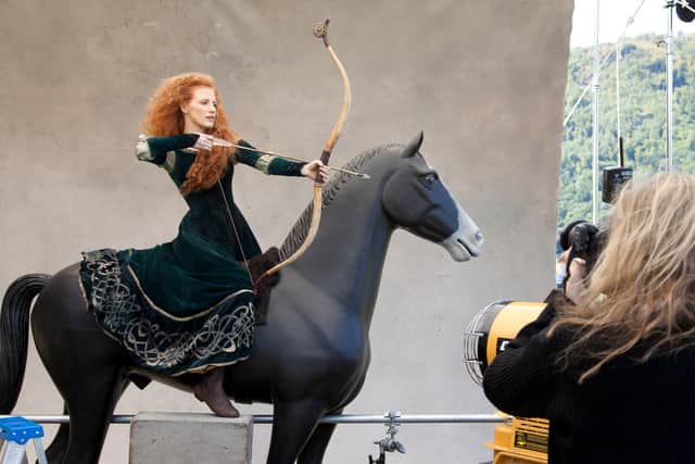 Jessica Chastain poses for acclaimed photographer Annie Leibovitz as Merida, the adventurous princess from the film Brave (Picture: Scott Brinegar/Disney Parks via Getty Images)