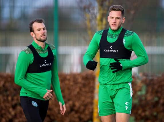 Jamie Gullan (R) and Christian Doidge took part in Hibs training on November 23 (Photo by Ross Parker / SNS Group)