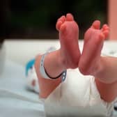 Newborn babies could once be taken away from mothers simply because they were not married (Picture: Didier Pallages/AFP via Getty Images)
