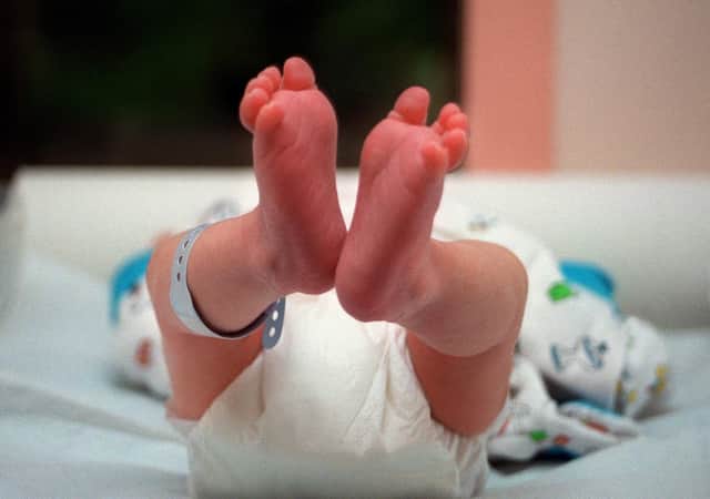 Newborn babies could once be taken away from mothers simply because they were not married (Picture: Didier Pallages/AFP via Getty Images)