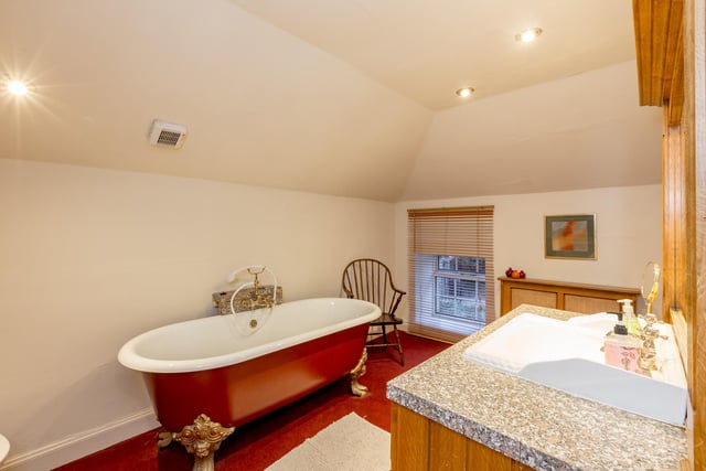 Another of the property's seven bathrooms, this another luxury room to enjoy a relaxing soak in the bath.
