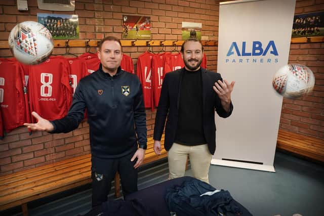 Richard Jacobs  of ALBA with Edinburgh University Association Football Club Manager, Sean McAuley. Photo by Stewart Attwood.