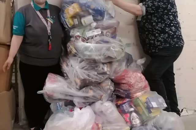 Poundland staff with some of the collected items.