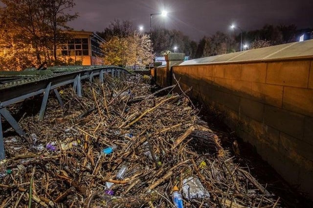 Tonnes of debris carried by the surging waters of the Don and deposited near Meadowhall.
