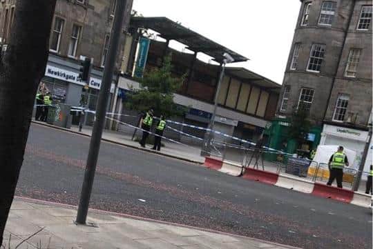 The area at the south end of the Newkirkgate in Leith has been taped off. Pic: Amanda Louise Paul/Edinburgh Crime and Breaking Incidents