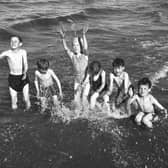 Children playing in the sea at Portobello in July 1966.