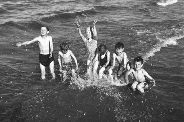Children playing in the sea at Portobello in July 1966.