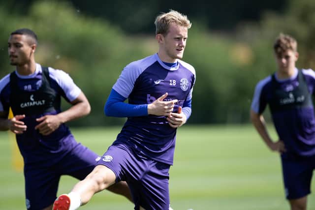 Ewan Henderson takes part during a Hibs training session. The midfielder will spend the 2023/24 campaign on loan at KV Oostende in Belgium. Picture: Paul Devlin / SNS Group