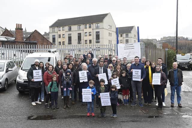 Residents were joined by MSPs and councillors at a protest against the planned development earlier this year.  Picture: Greg Macvean.