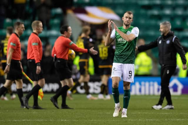 Christian Doidge applauds the fans after the 1-1 draw with Motherwell