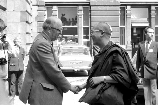 The Dalai Lama, spiritual leader of Tibet, is welcomed to Edinburgh City Chambers by Lord Provost John McKay in May 1984.