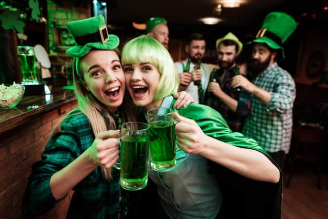 People wear their best green outfits on St Patrick's Day, but the 2021 celebrations will be different due to Covid (Shutterstock)