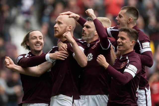 Liam Boyce celebrates after opening the scoring for Hearts against Motherwell.