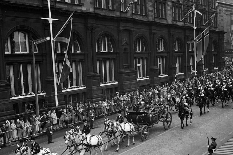 In October 1962 King Olav of Norway visited Edinburgh during a state visit to Scotland. Thousands lined the streets to welcome him during a lavish royal procession, pictured making its way down Lothian Road.