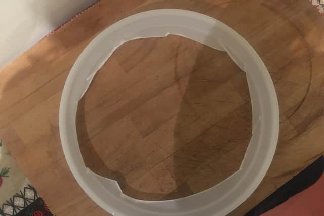 Cut a hole in one of your bucket lids (I'll admit this isn't super neat). You're then going to put this on the tap bucket, and balance your other bucket on the rim to allow the liquid to drain out the bottom during the Vorlauf and sparge processes.