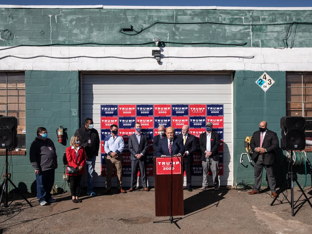 Attorney for the President, Rudy Giuliani speaks to the media at a press conference held in the not at all odd location of the back parking lot of Four Seasons Total Landscaping in Philadelphia, Pennsylvania. The press conference took place just minutes after news networks announced that Joe Biden had won the presidency over Donald Trump after it was projected that he had won the state of Pennsylvania. Guiliani claimed voter fraud and a Trump victory.